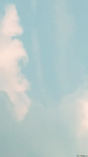 A Calming Landscape Of A Rolling Grassy Valley Dotted With Trees And Mountains, With A Cloudy Aesthetic Wallpaper