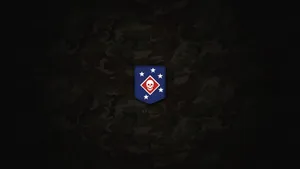 A Camouflage Background With A Military Emblem Wallpaper