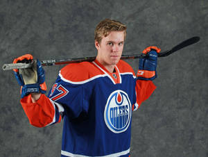 A Canadian Ice Hockey Player Connor Mcdavid Wallpaper