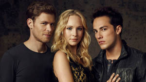 A Captivating Moment Between Caroline Forbes, Klaus, And Tyler. Wallpaper