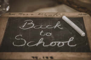 A Chalkboard With The Word Back To School Written On It Wallpaper