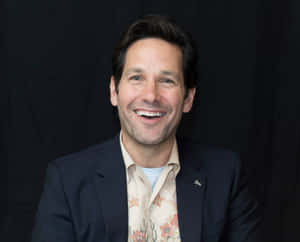 A Charismatic Portrait Of Actor Paul Rudd. Wallpaper