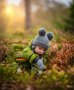 A Cheerful Baby Enjoying Playtime Wallpaper