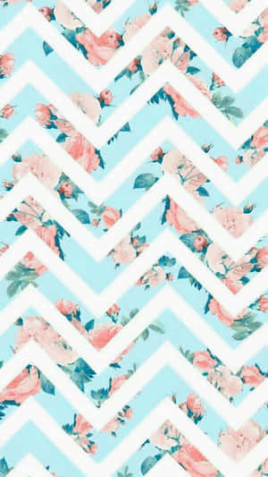 A Chevron Pattern With Pink And Blue Flowers Wallpaper