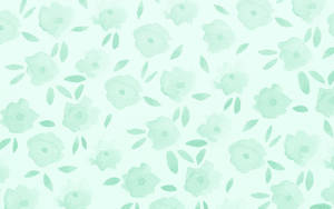 A Chic, Pastel Green Laptop Perfect For Those Looking To Add Some Aesthetic Flair To Their Work Or Study Space. Wallpaper