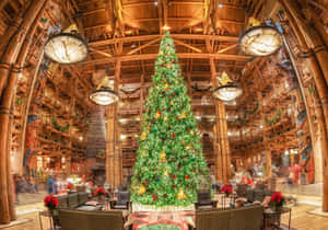 A Christmas Tree In The Lobby Of A Hotel Wallpaper