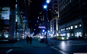 A City Street At Night Wallpaper