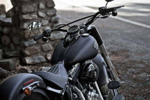 A Classic Harley Davidson Hd Motorcycle On The Open Road. Wallpaper