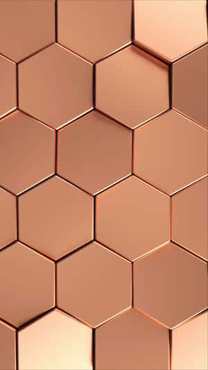 A Close Up Of A Copper Hexagonal Tile Wallpaper