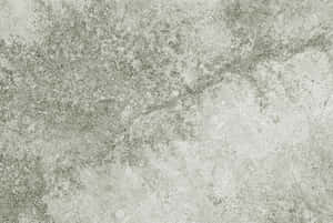 A Close Up Of A Gray Tile With White And Gray Wallpaper