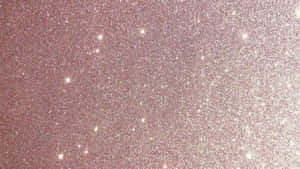 A Close Up Of A Pink Glitter Surface Wallpaper