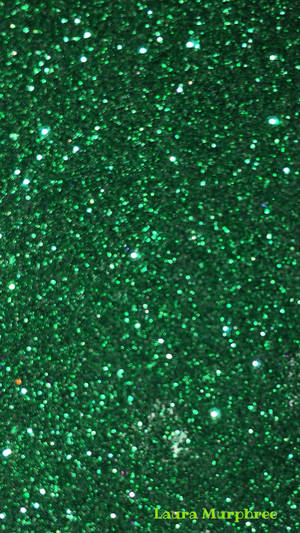 A Close Up Of Green Glitter Wallpaper