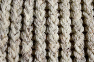 A Close-up Shot Of Chunky Yarn For Knitting Wallpaper