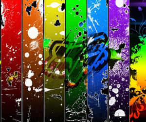 A Colorful Background With Paint Splatters Wallpaper