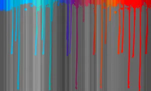 A Colorful Paint Dripping On A Gray Background Wallpaper