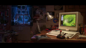 A Computer Monitor On A Desk Wallpaper