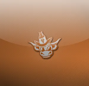 A Cow Logo On An Orange Background Wallpaper