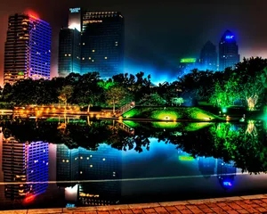 A Cozy Cabin Surrounded By Lush Greenery Wallpaper