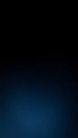 A Dark Blue Background With A Light Shining On It Wallpaper