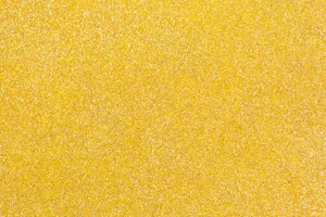 A Dazzling Array Of Yellow Glitter Wallpaper