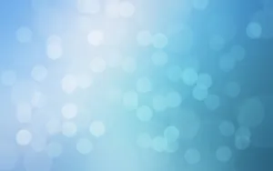 A Dazzling Background Of Light-blue Bokeh Wallpaper