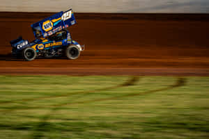 A Dirt Track Race Car Wallpaper