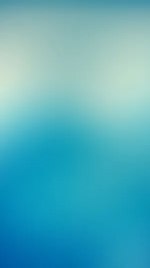 A Faded Beach Scene Along The Crystal Clear Water Of A Caribbean Paradise Wallpaper