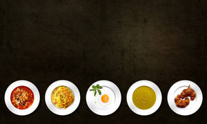 A Feast For The Eyes - Five Assorted Plates Of Delectable Cuisine. Wallpaper