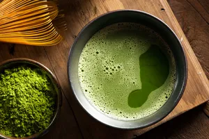 A Fresh And Vibrant Bowl Of Matcha Tea. Wallpaper