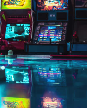 A Game Room With A Pool Table And Arcade Machines Wallpaper