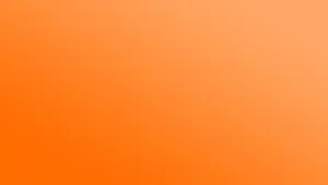 A Glowing Orange Sunrise Wallpaper