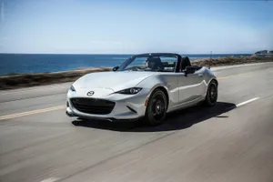 A Gorgeous 2019 Miata Convertible On A Picturesque San Diego Beach. Wallpaper