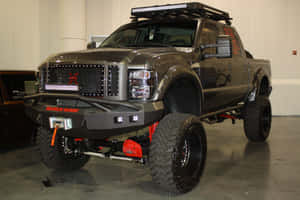 A Gray Truck With A Red Bed Liner Wallpaper