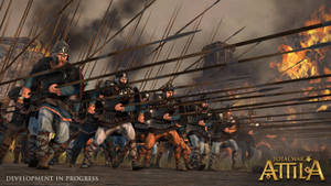 A Group Of Men With Swords In Front Of A Fire Wallpaper