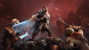 A Group Of Men With Swords In The Middle Of A Dark Scene Wallpaper