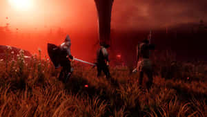 A Group Of People Standing In A Field With A Red Sky Wallpaper