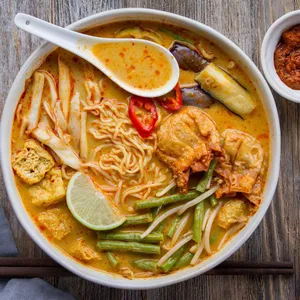 A Hearty Bowl Of Curry Laksa Ramen Wallpaper