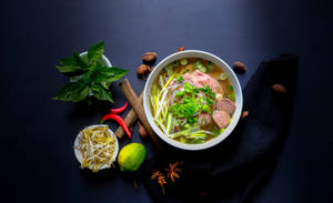 A Hearty Bowl Of Pho Vietnamese Spicy Noodles Wallpaper