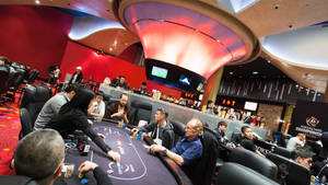 A High-stakes Poker Game In Macau Championship Wallpaper