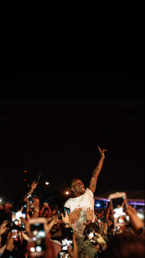 A Hip Hop Artist In Their Element. Wallpaper