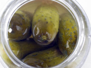 A Jar Full Of Crunchy Pickled Cucumbers Wallpaper