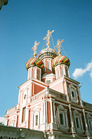 A Large Building With A Clock Tower Wallpaper