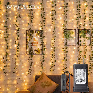 A Living Room With A Christmas Light String Wallpaper