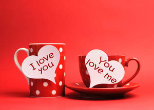 A Lovely Hearts Message On A Coffee Mug And Cup Wallpaper