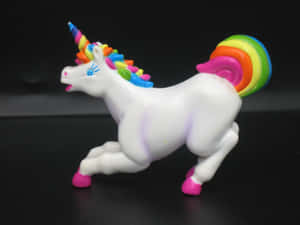 A Majestic Lisa Frank Unicorn Against A Whimsical Starry Sky Wallpaper