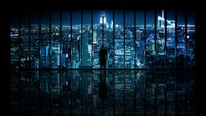 A Man Admiring The City Lights Wallpaper