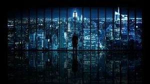 A Man Admiring The City Lights Wallpaper