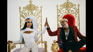 A Man And Woman Sitting On A Throne Wallpaper