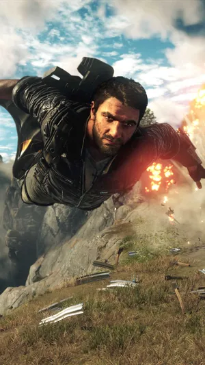 A Man Flying Over A Mountain With A Gun Wallpaper