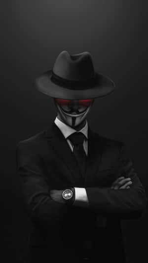 A Man In A Suit And Hat Wallpaper